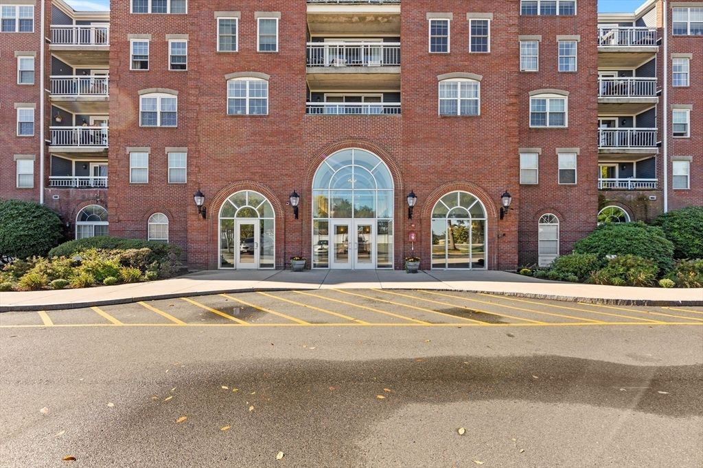 Exterior, Facade, Brick Facade, Condo Building