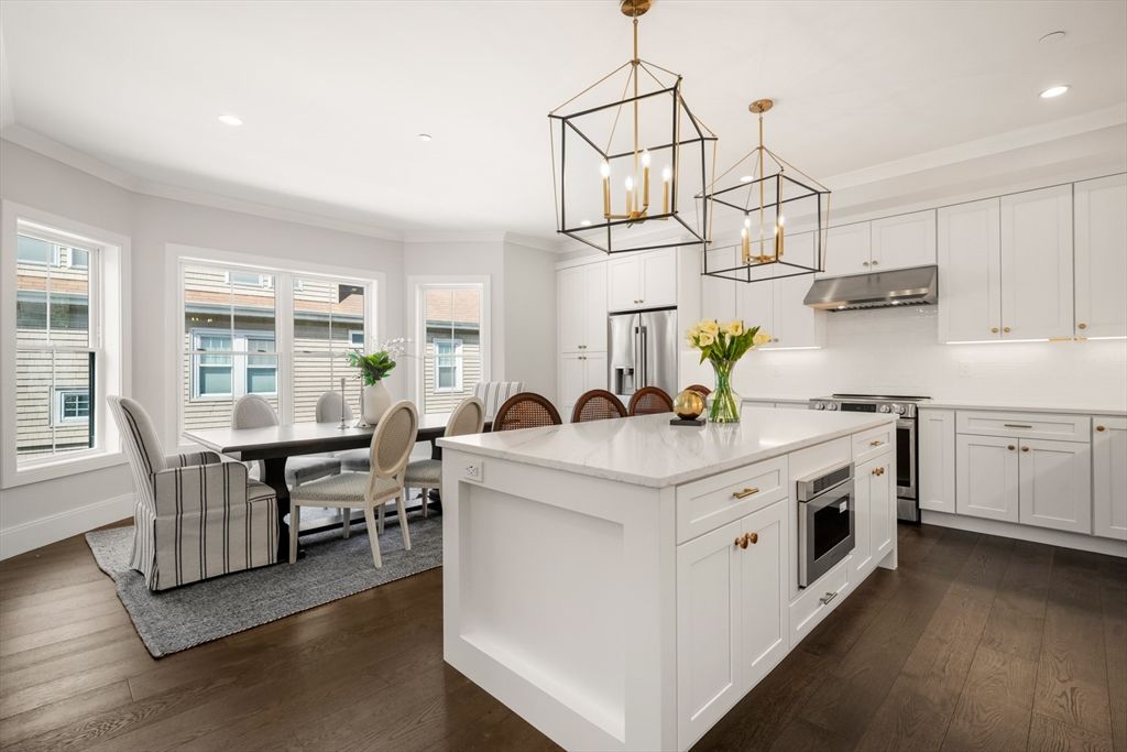 Dining room, Interior, Kitchen, Pendant Lights, Recessed Lighting, Stainless Steel Appliances, Wood Texture Flooring