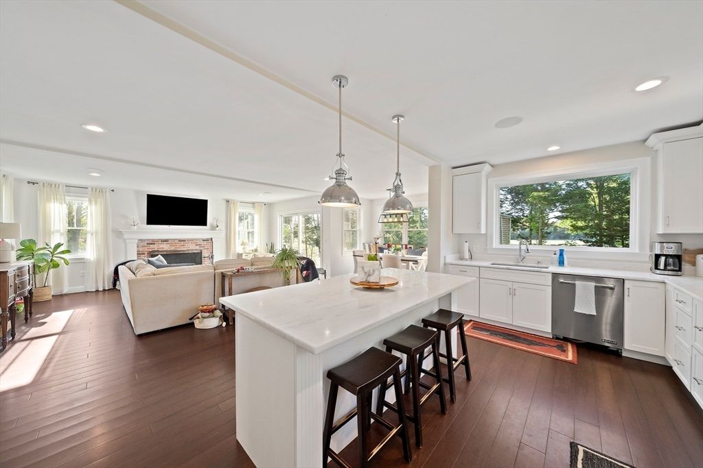 Dining room, Fireplace, Interior, Kitchen, Living room, Pendant Lights, Recessed Lighting, Stainless Steel Appliances, Wood Texture Flooring