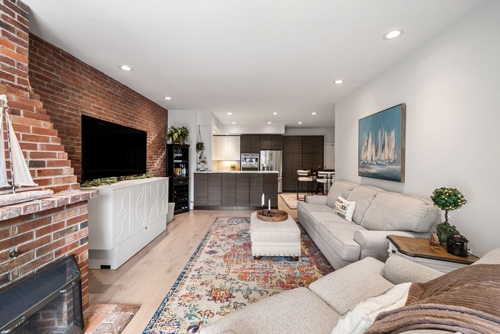 Interior, Kitchen, Living room, Recessed Lighting, Stainless Steel Appliances, Stone Walls, Wood Texture Flooring