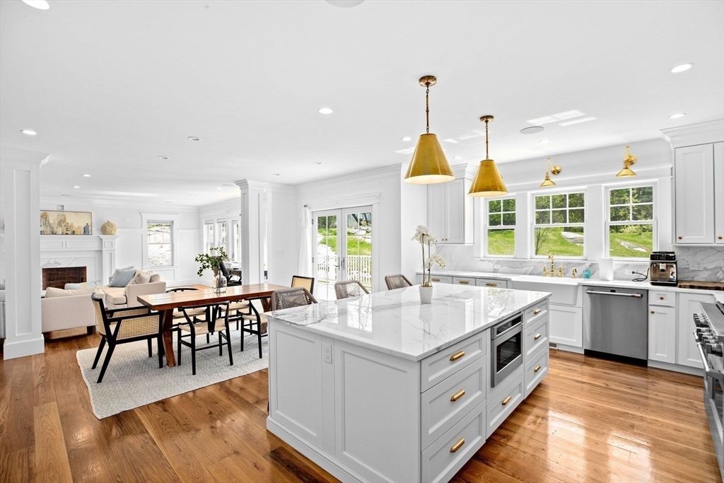 Dining room, Fireplace, Interior, Kitchen, Living room, Pendant Lights, Recessed Lighting, Stainless Steel Appliances, Wood Texture Flooring