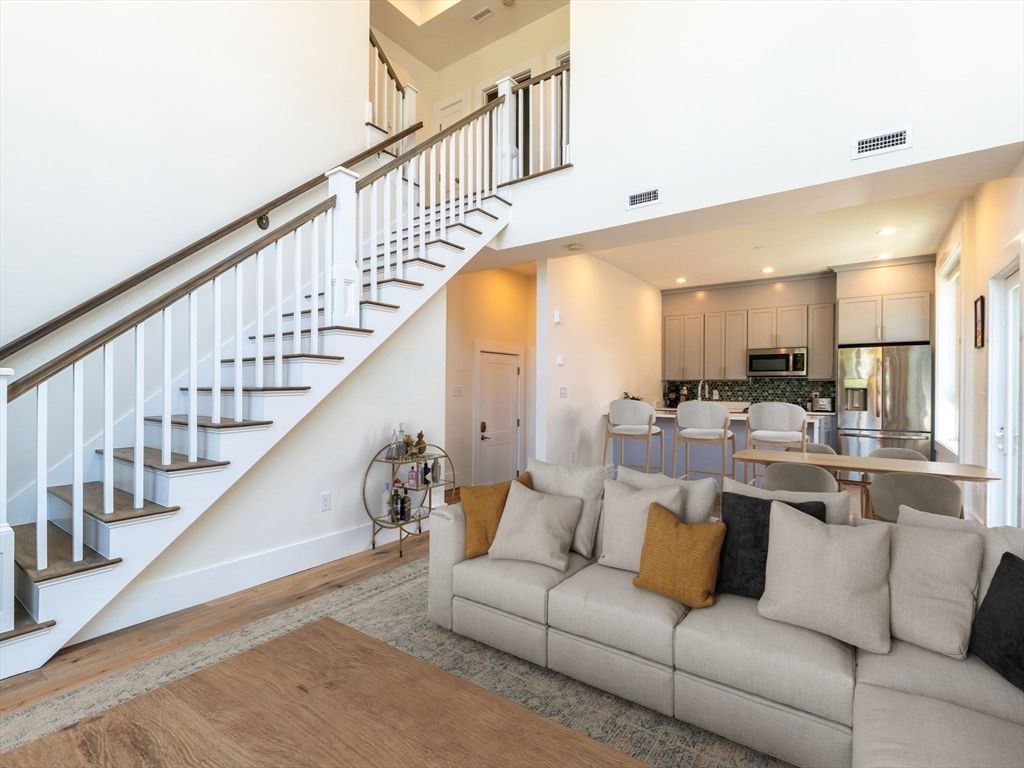 Dining room, Interior, Kitchen, Living room, Recessed Lighting, Stainless Steel Appliances, Wood Texture Flooring