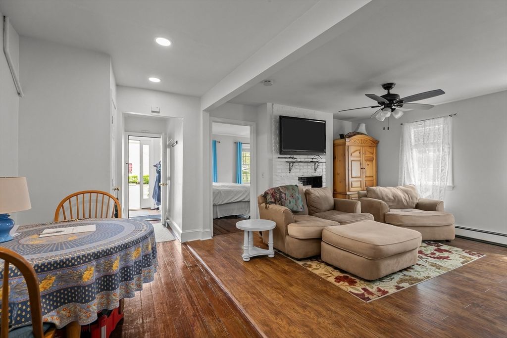 Fireplace, Interior, Living room, Recessed Lighting, Wood Texture Flooring