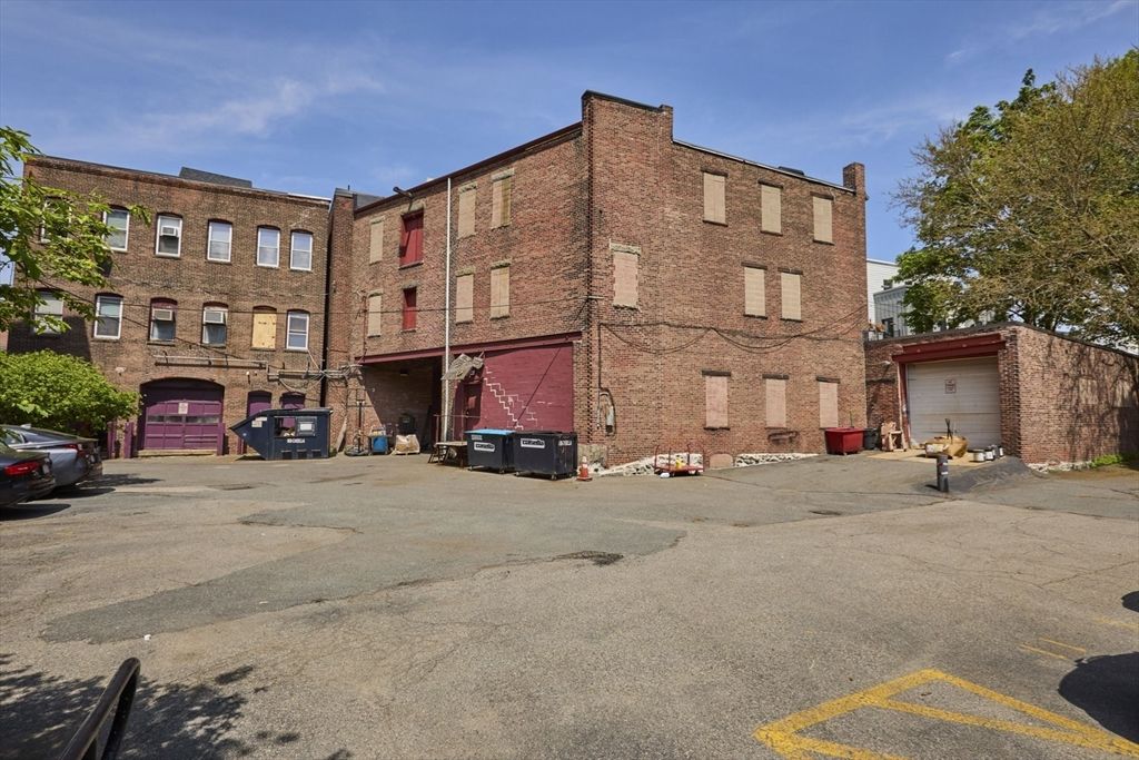 Attached, Detached Garage, Exterior, Facade, Brick Facade, Condo Building