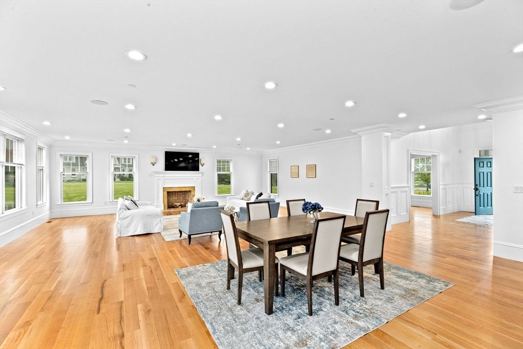 Dining room, Fireplace, Interior, Living room, Recessed Lighting, Wood Texture Flooring