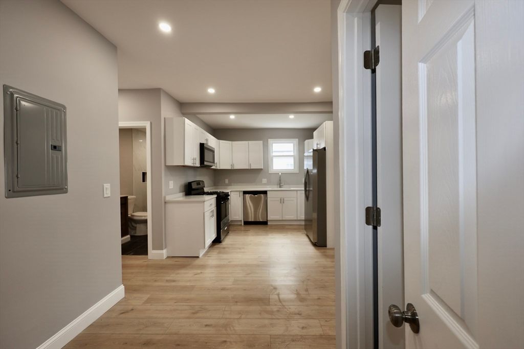 Interior, Kitchen, Recessed Lighting, Stainless Steel Appliances, Wood Texture Flooring