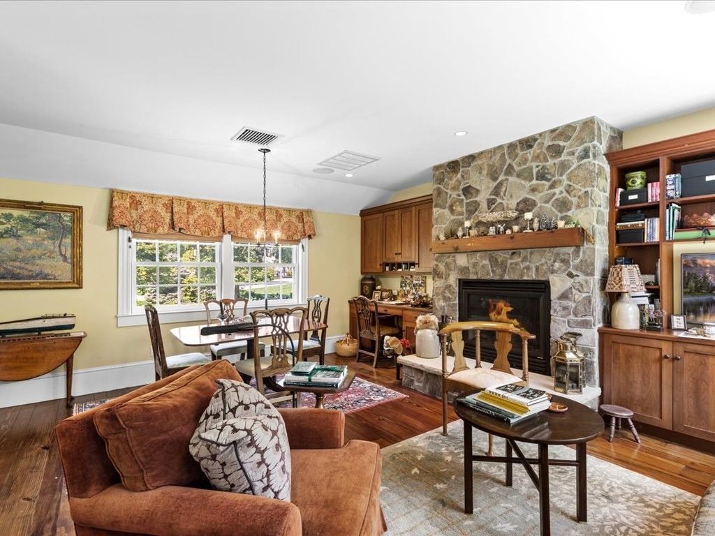 Dining room, Fireplace, Interior, Living room, Pendant Lights, Recessed Lighting, Stone Walls, Wood Texture Flooring