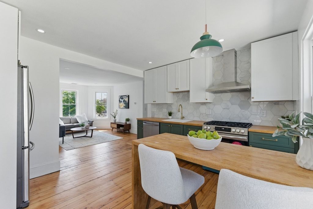 Dining room, Interior, Kitchen, Living room, Pendant Lights, Recessed Lighting, Stainless Steel Appliances, Wood Texture Flooring