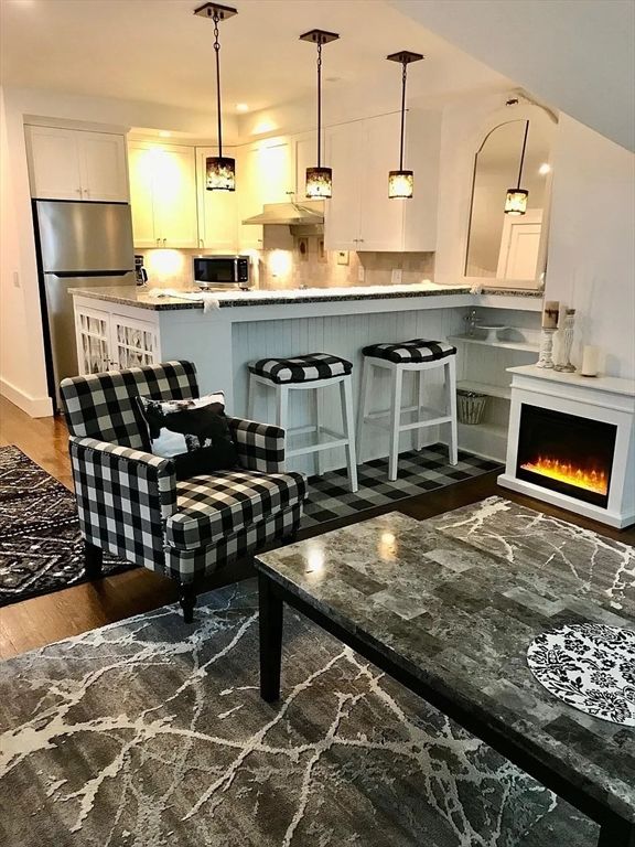 Fireplace, Interior, Kitchen, Pendant Lights, Stainless Steel Appliances, Wood Texture Flooring