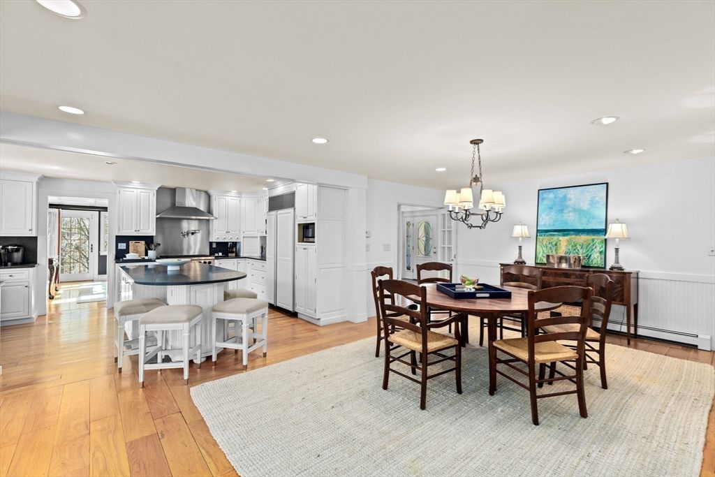 Chandelier, Dining room, Interior, Kitchen, Recessed Lighting, Stainless Steel Appliances, Wood Texture Flooring
