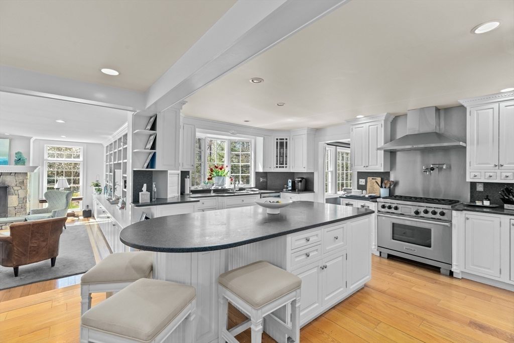 Dining room, Interior, Kitchen, Living room, Recessed Lighting, Stainless Steel Appliances, Wood Texture Flooring