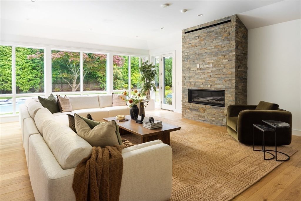Fireplace, Interior, Living room, Recessed Lighting, Stone Walls, Wood Texture Flooring