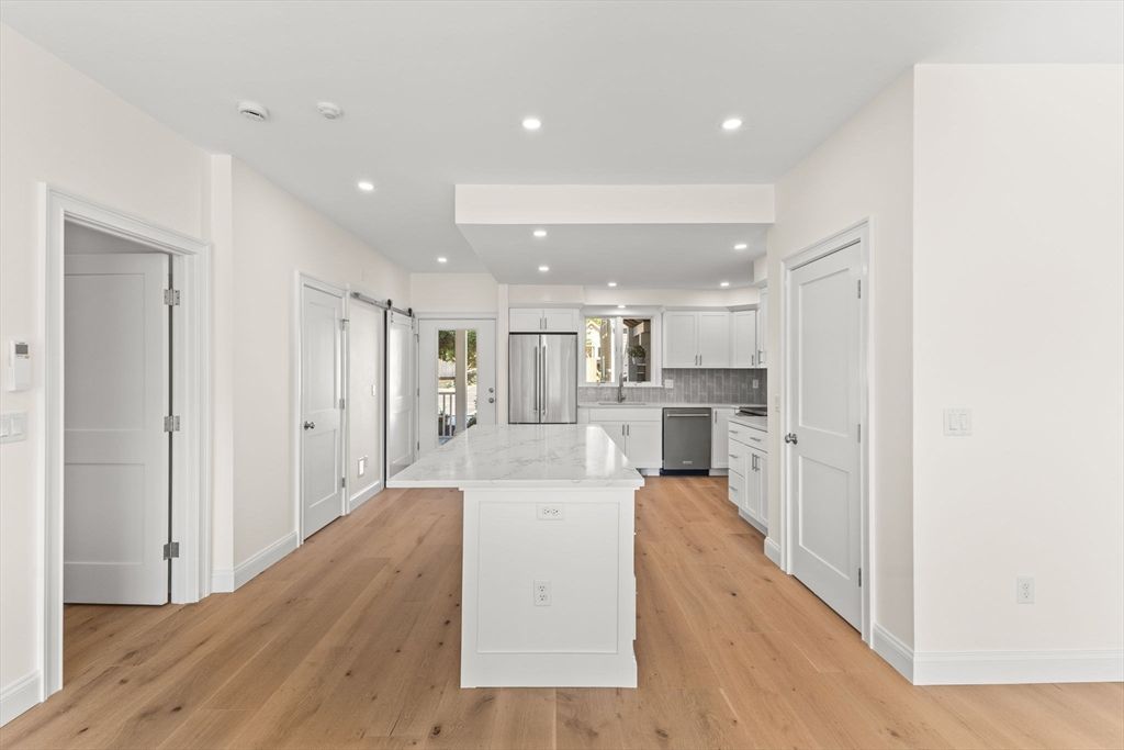 Interior, Kitchen, Recessed Lighting, Stainless Steel Appliances, Wood Texture Flooring