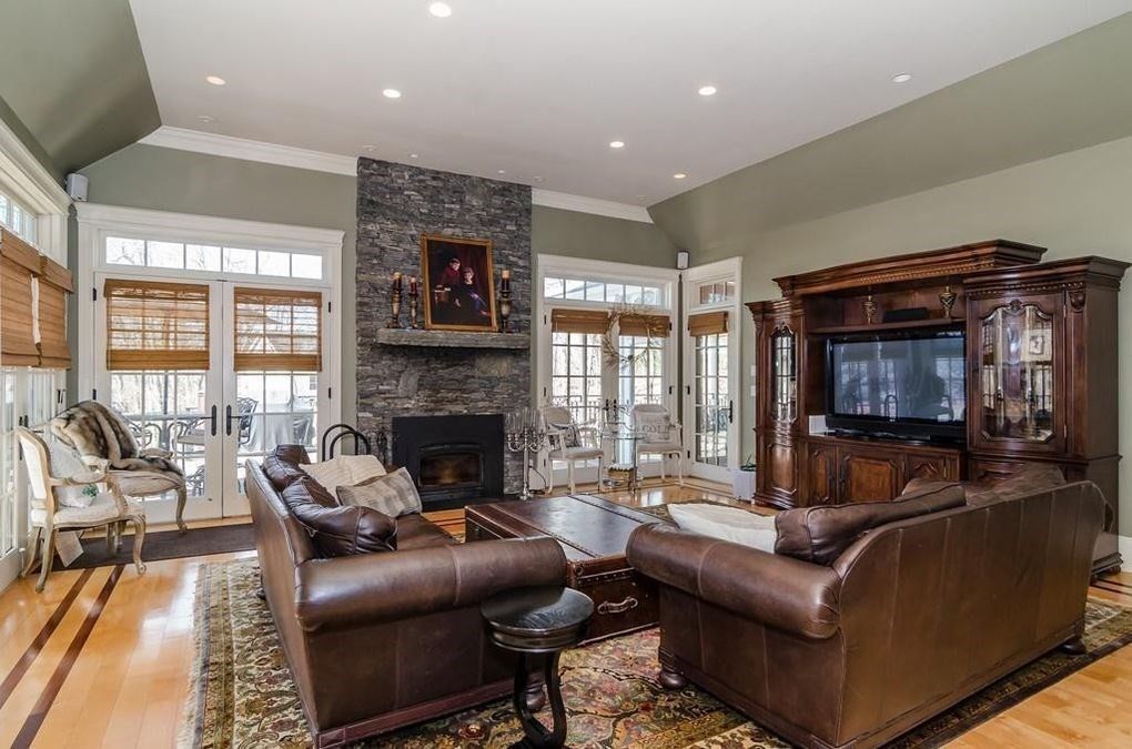 Fireplace, Interior, Living room, Recessed Lighting, Stone Walls, Wood Texture Flooring