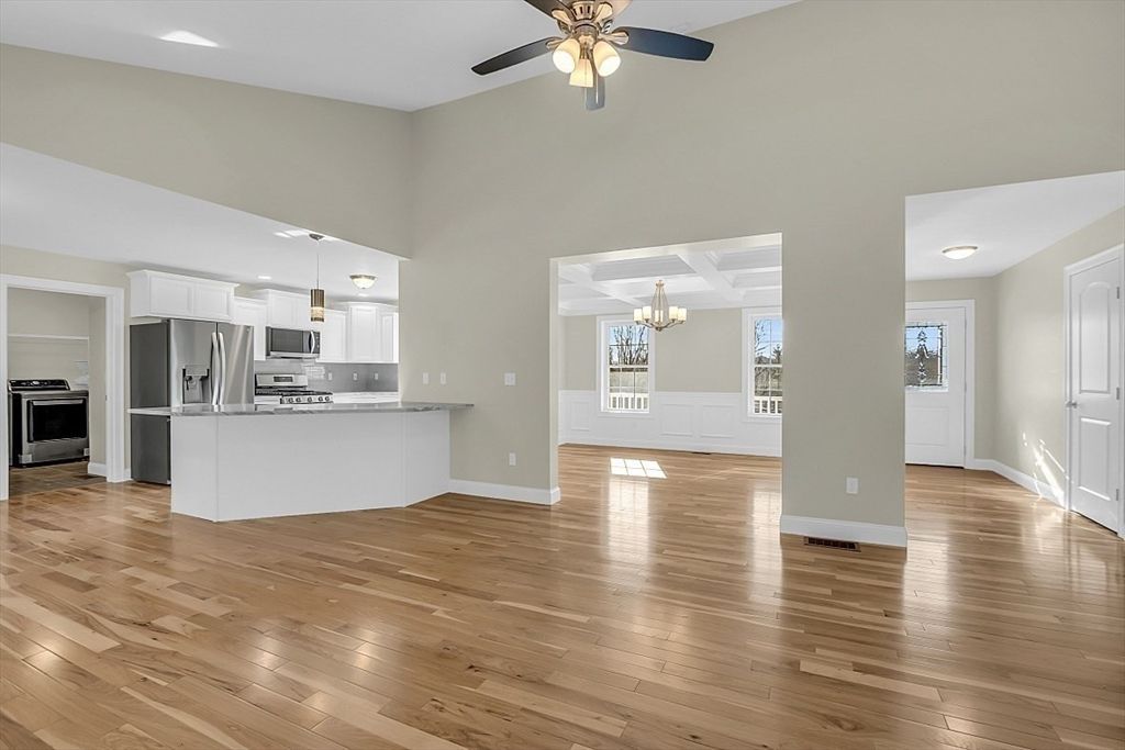 Chandelier, Empty room, Interior, Kitchen, Pendant Lights, Stainless Steel Appliances, Wood Texture Flooring