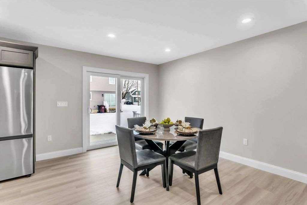 Dining room, Interior, Recessed Lighting, Stainless Steel Appliances, Wood Texture Flooring