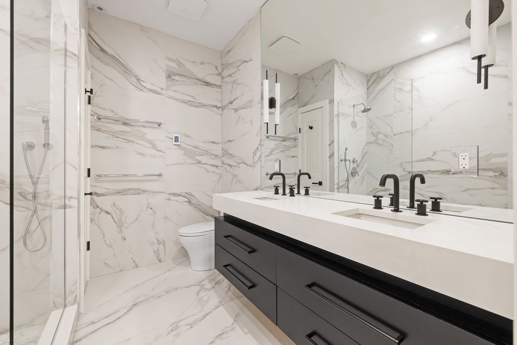 Bathroom, Dual Sink Vanities, Glass Shower, Interior, Marble, Marble Walls, Recessed Lighting