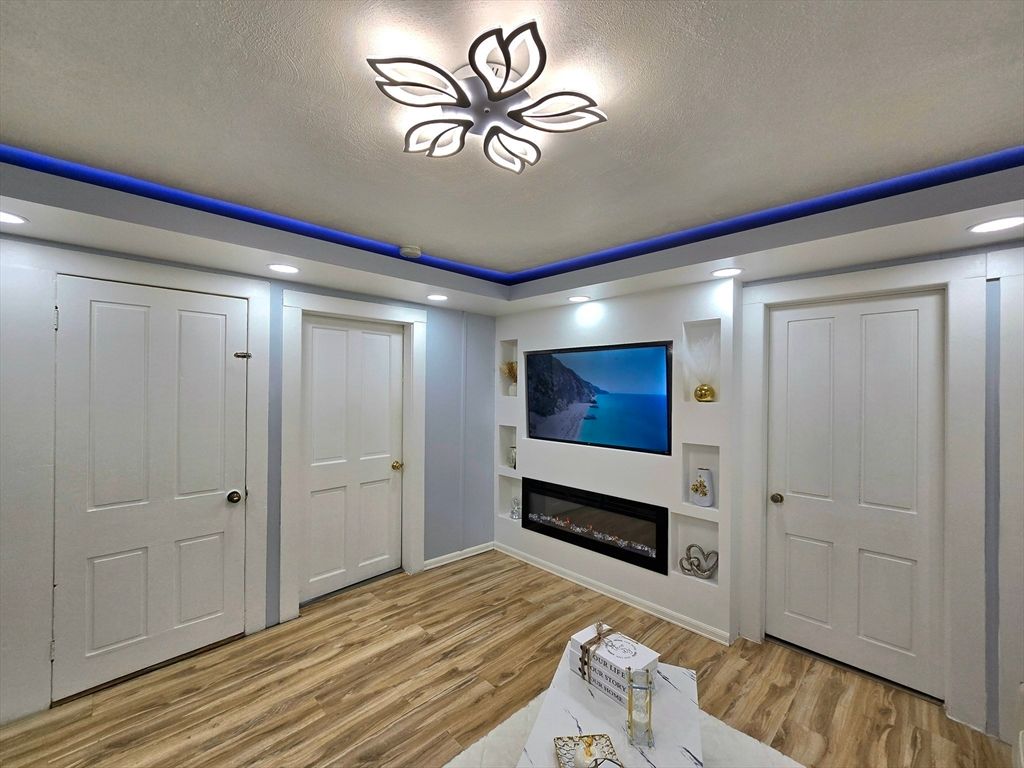 Fireplace, Interior, Recessed Lighting, Wood Texture Flooring
