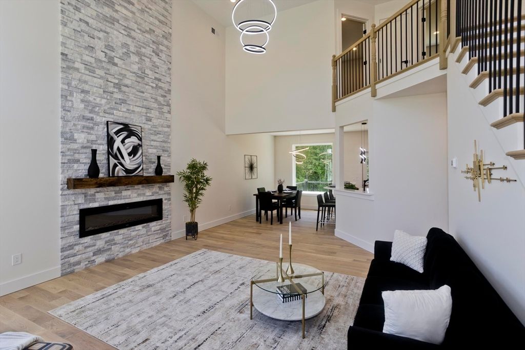 Dining room, Fireplace, Interior, Living room, Pendant Lights, Stone Walls, Wood Texture Flooring