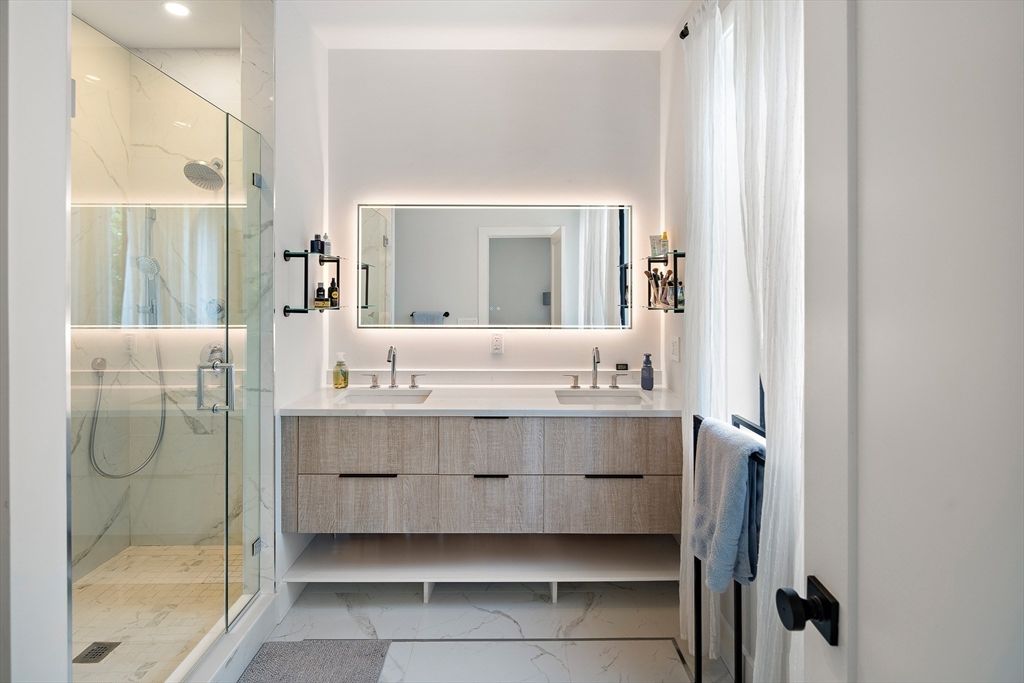 Bathroom, Dual Sink Vanities, Glass Shower, Interior, Marble, Marble Walls, Recessed Lighting