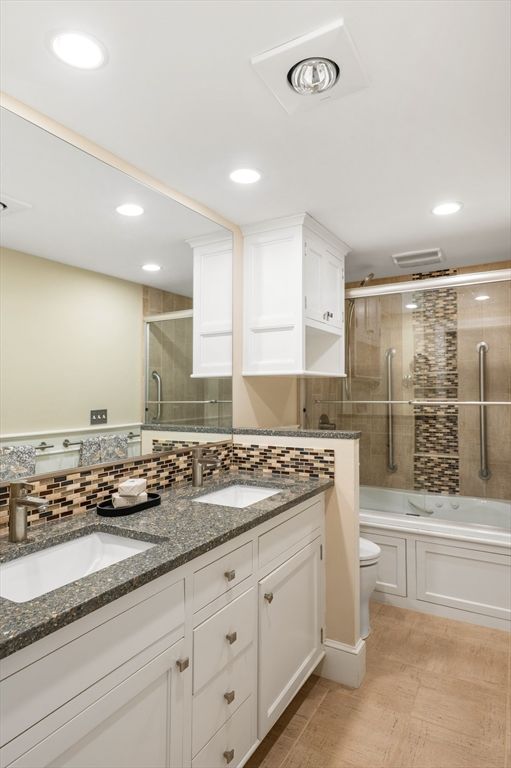 Bathroom, Dual Sink Vanities, Glass Shower, Interior, Recessed Lighting, Wood Texture Flooring