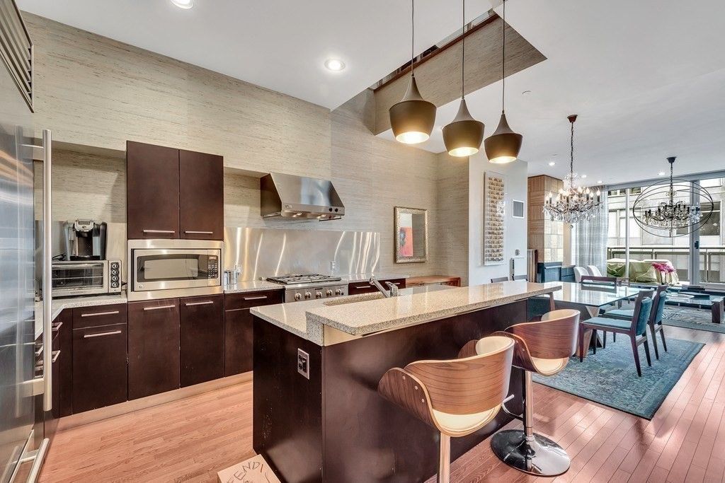 Chandelier, Dining room, Interior, Kitchen, Pendant Lights, Recessed Lighting, Stainless Steel Appliances, Wood Texture Flooring