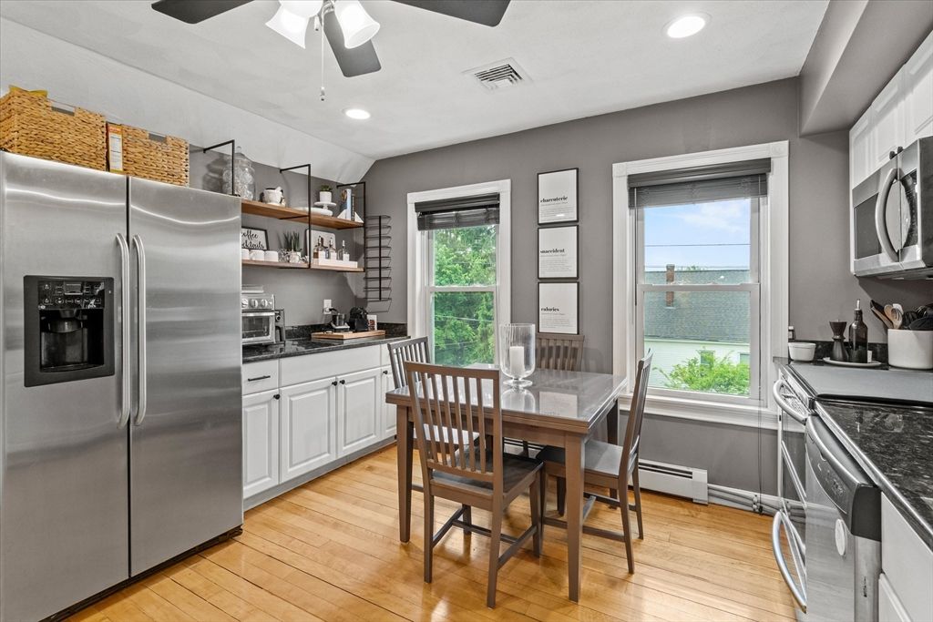 Dining room, Interior, Kitchen, Recessed Lighting, Stainless Steel Appliances, Water, Wood Texture Flooring