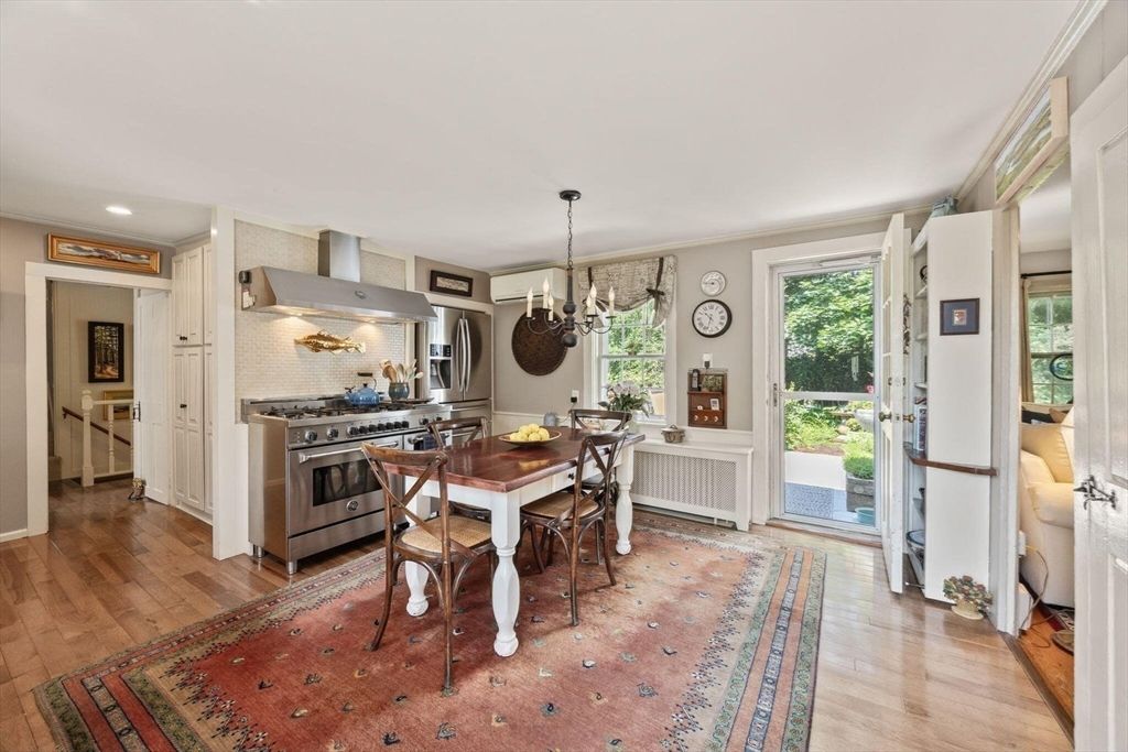 Chandelier, Dining room, Interior, Kitchen, Pendant Lights, Recessed Lighting, Stainless Steel Appliances, Wood Texture Flooring