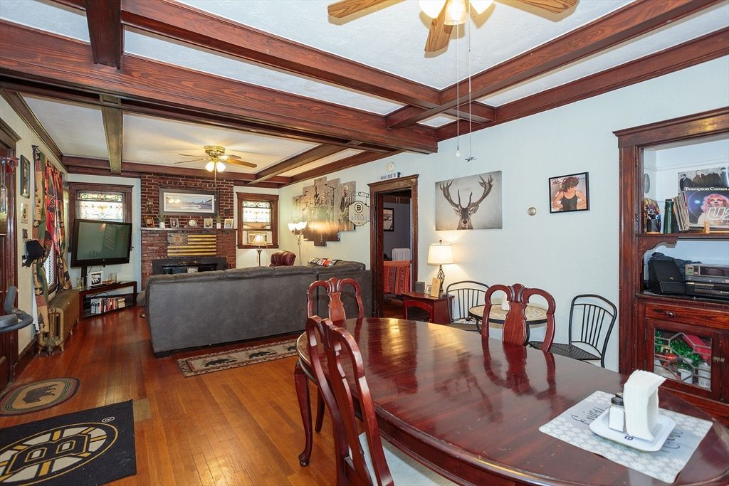 Dining room, Fireplace, Interior, Living room, Stone Walls, Wooden Beams, Wood Texture Flooring