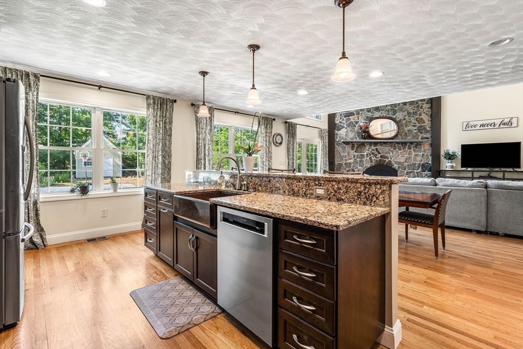Fireplace, Interior, Kitchen, Pendant Lights, Recessed Lighting, Stone Walls, Wood Texture Flooring