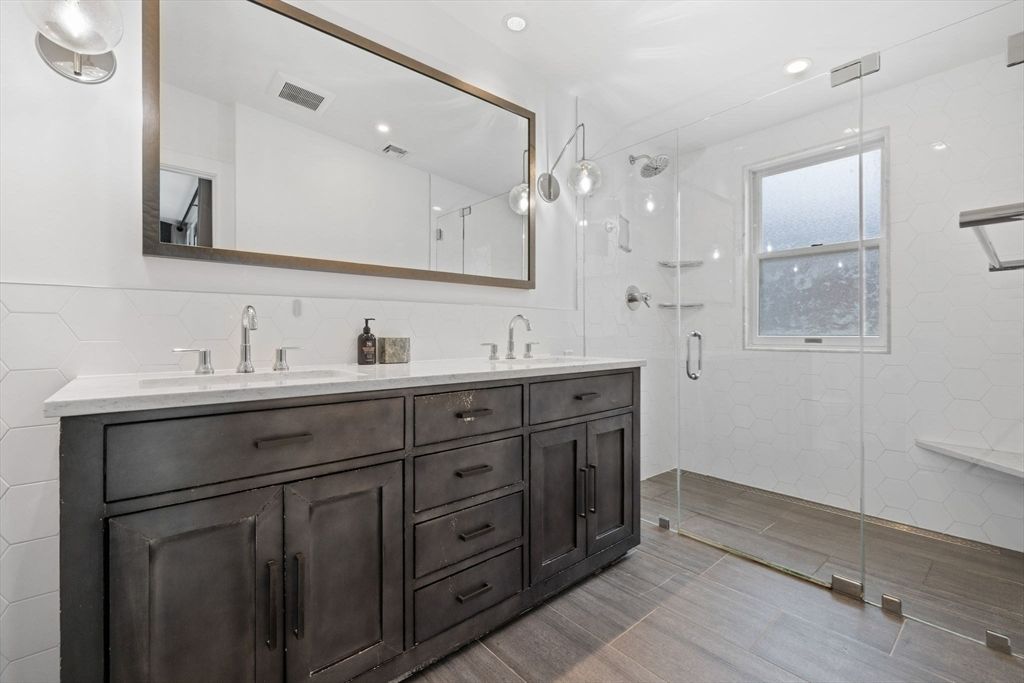 Bathroom, Dual Sink Vanities, Glass Shower, Interior, Recessed Lighting, Wood Texture Flooring