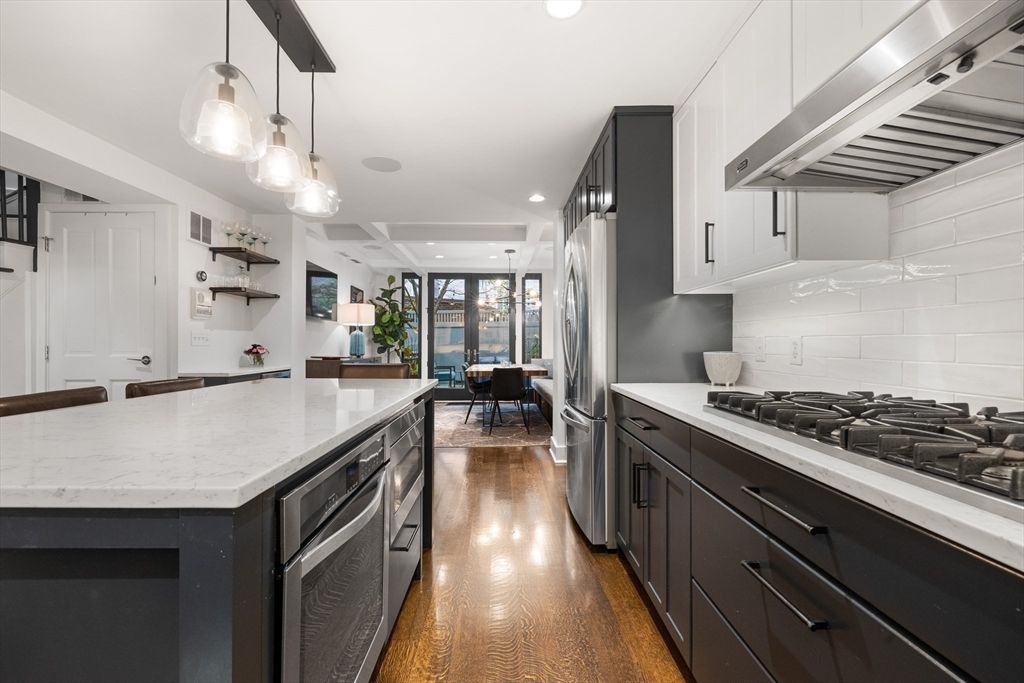Dining room, Interior, Kitchen, Pendant Lights, Recessed Lighting, Stainless Steel Appliances, Wood Texture Flooring