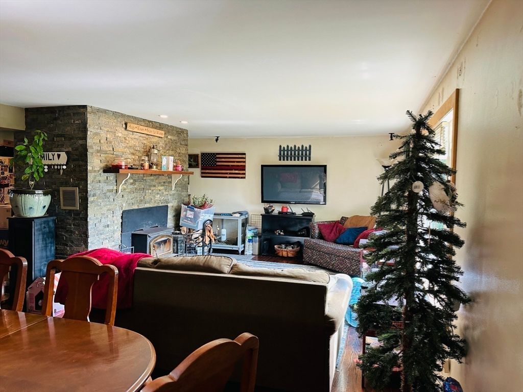 Dining room, Fireplace, Interior, Living room, Recessed Lighting, Stone Walls