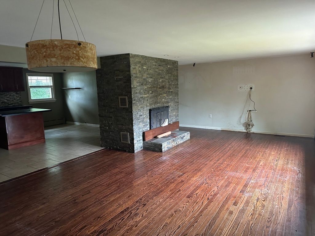 Empty room, Fireplace, Interior, Pendant Lights, Wood Texture Flooring