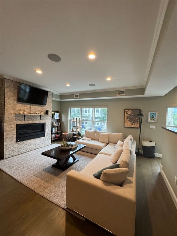 Fireplace, Interior, Living room, Recessed Lighting, Stone Walls, Wood Texture Flooring