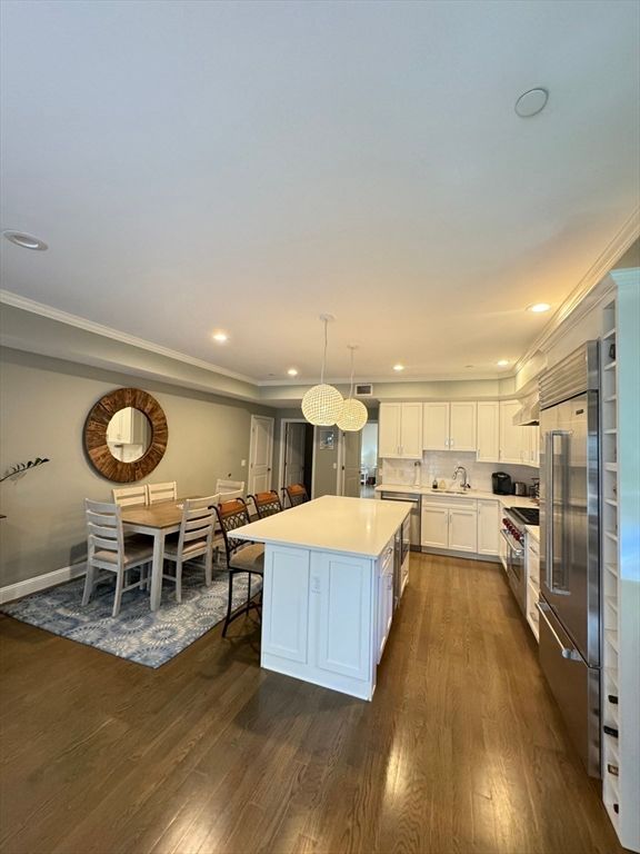 Dining room, Interior, Kitchen, Recessed Lighting, Stainless Steel Appliances, Wood Texture Flooring