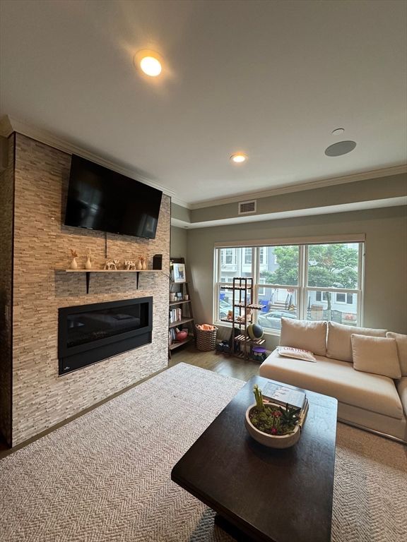 Fireplace, Interior, Living room, Recessed Lighting, Stone Walls, Wood Texture Flooring