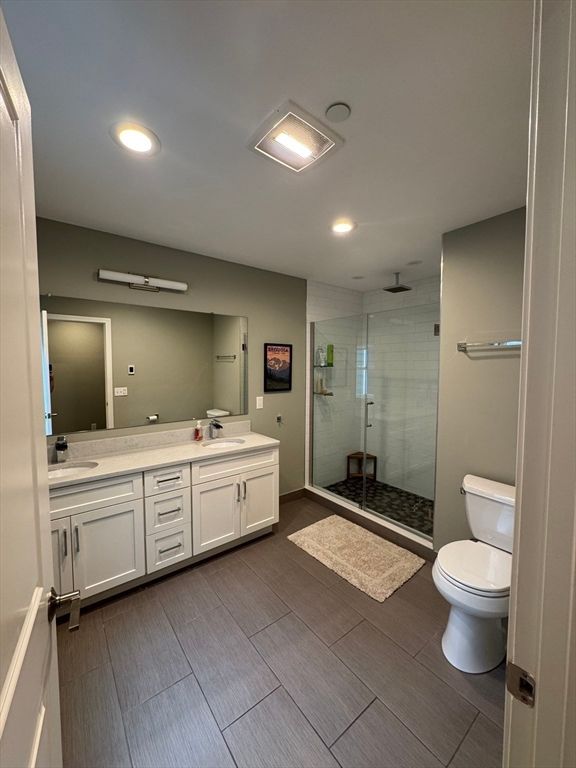 Bathroom, Dual Sink Vanities, Glass Shower, Interior, Recessed Lighting, Wood Texture Flooring