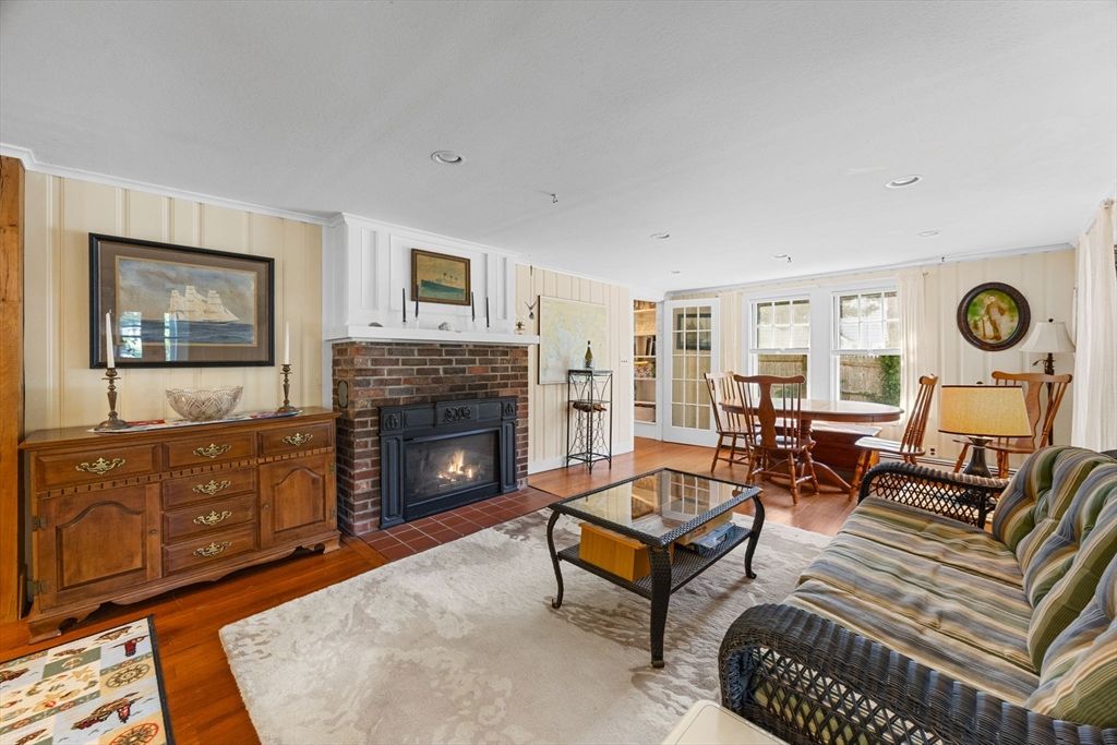 Dining room, Fireplace, Interior, Living room, Recessed Lighting, Wood Texture Flooring