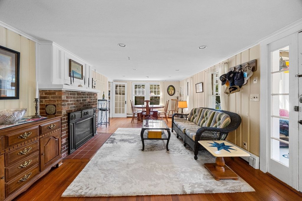 Dining room, Fireplace, Interior, Living room, Recessed Lighting, Wood Texture Flooring