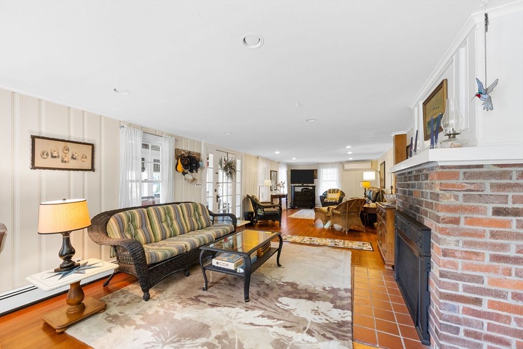 Fireplace, Interior, Living room, Recessed Lighting, Stone Walls, Wood Texture Flooring