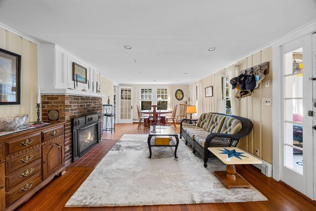 Dining room, Fireplace, Interior, Living room, Recessed Lighting, Wood Texture Flooring