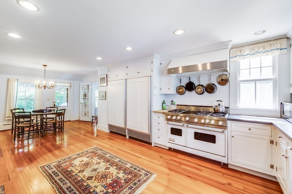 Chandelier, Dining room, Interior, Kitchen, Pendant Lights, Recessed Lighting, Stainless Steel Appliances, Wood Texture Flooring
