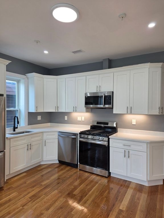 Interior, Kitchen, Recessed Lighting, Stainless Steel Appliances, Wood Texture Flooring