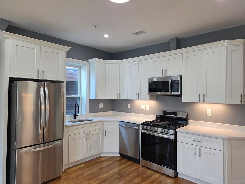Interior, Kitchen, Recessed Lighting, Stainless Steel Appliances, Wood Texture Flooring