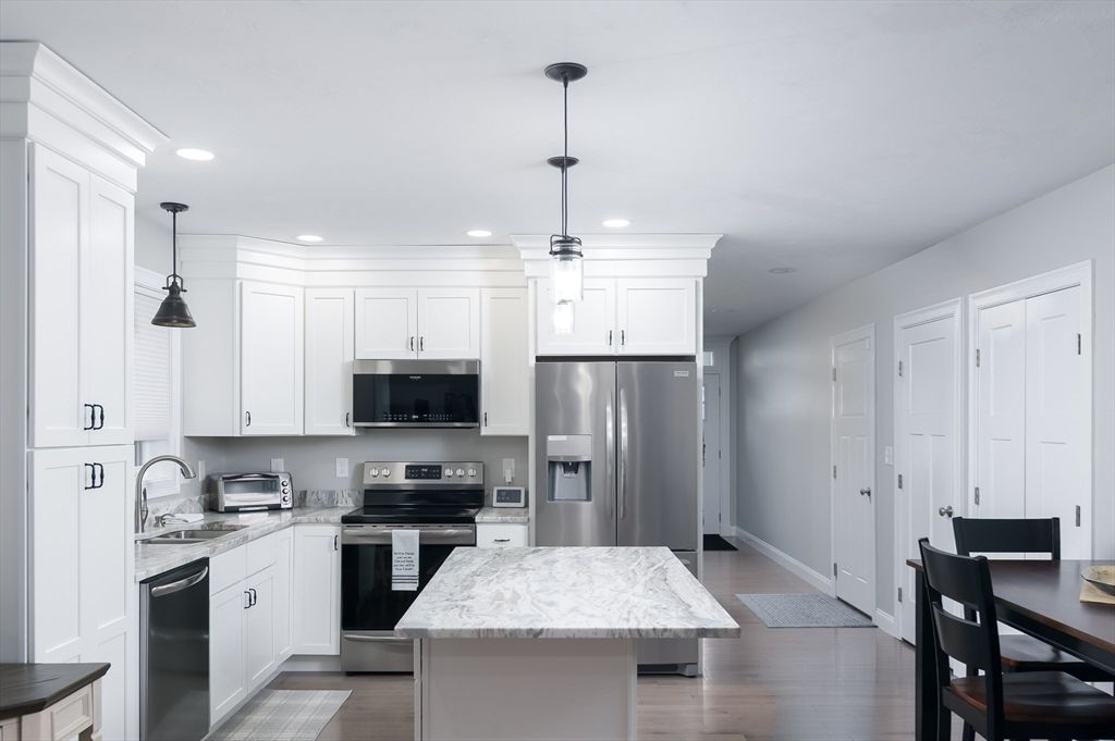 Interior, Kitchen, Pendant Lights, Recessed Lighting, Stainless Steel Appliances, Wood Texture Flooring