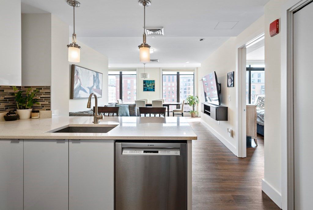 Dining room, Interior, Kitchen, Pendant Lights, Recessed Lighting, Stainless Steel Appliances, Wood Texture Flooring