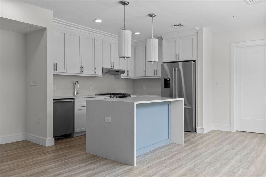 Interior, Kitchen, Pendant Lights, Recessed Lighting, Stainless Steel Appliances, Wood Texture Flooring