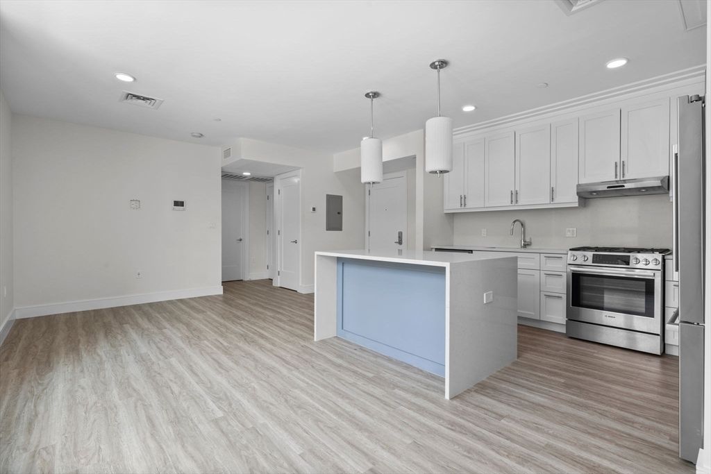 Interior, Kitchen, Pendant Lights, Recessed Lighting, Stainless Steel Appliances, Wood Texture Flooring