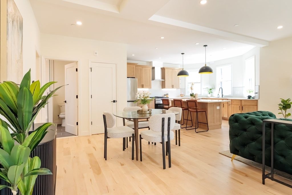 Dining room, Interior, Kitchen, Pendant Lights, Recessed Lighting, Stainless Steel Appliances, Wood Texture Flooring